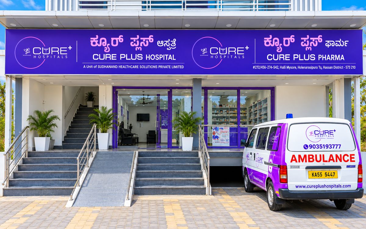 CurePlus Hospital, Halli Mysuru: front view with ambulance